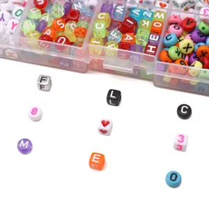 Detailed view of colorful acrylic letter and number beads for DIY jewelry making