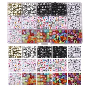 24-compartment storage box filled with acrylic alphabet and heart beads for DIY jewelry