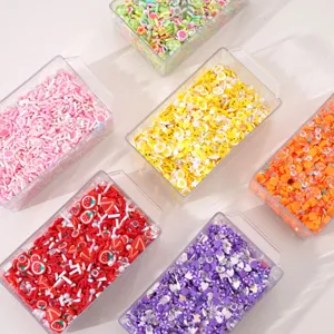Assortiment de tranches de pâte polymère et paillettes en boîtes pour loisirs créatifs