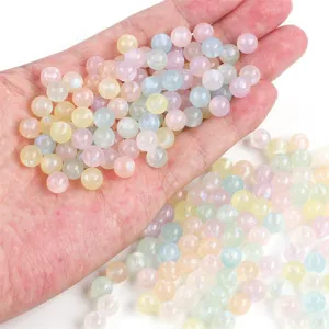 Close-up of colorful iridescent mermaid acrylic beads for DIY jewelry making