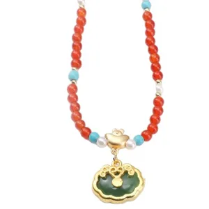 Ethnic Chinese style alloy necklace with orange beads and green ruyi lock pendant