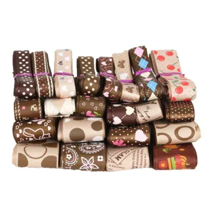 Assorted printed grosgrain ribbons for DIY crafts and festive wedding decorations.