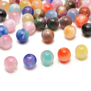 Close-up macro view of colorful 8mm gradient glitter beads for DIY handmade jewelry