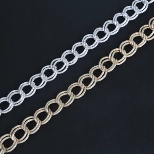 Close-up of gold and silver aluminum chains with textured double ring links for DIY crafts