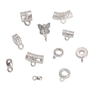 Collection of various silver alloy charms and spacer beads for DIY jewelry making crafts