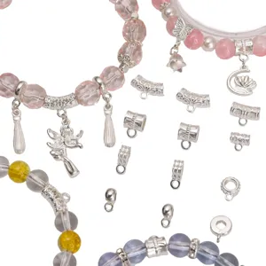 Macro view of silver alloy spacer beads and charms on elegant DIY beaded bracelets