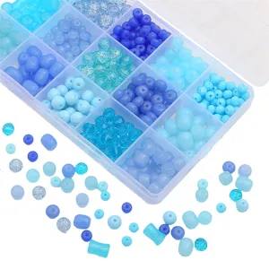 Blue glass and acrylic bead assortment for DIY jewelry making in clear organizer box