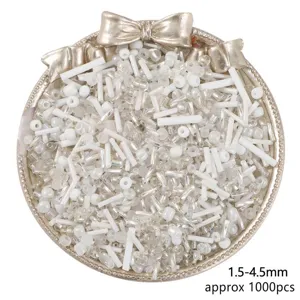Mixed white and clear glass seed beads in round and tube shapes for DIY jewelry making.
