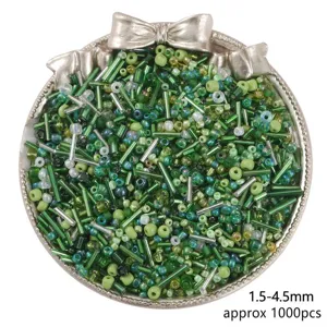 Detailed view of mixed green glass seed and bugle beads for DIY jewelry making 1000pcs