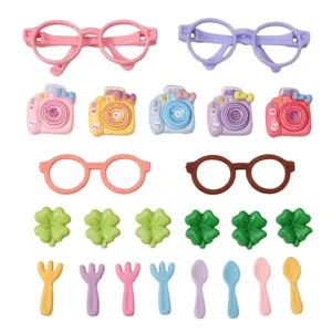 Assorted miniature doll accessories set including colorful glasses cameras and tableware