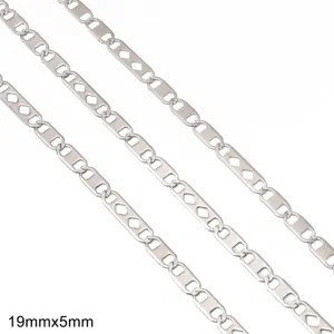Macro view showing unique rectangular links with diamond cutouts on stainless steel chain