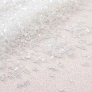 Macro detail of white AB iridescent crushed glass stones for DIY handmade craft filling