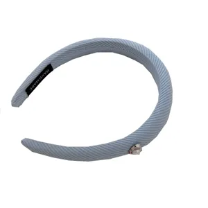 Elegant light blue ribbed headband with silver-tone heart embellishment for women