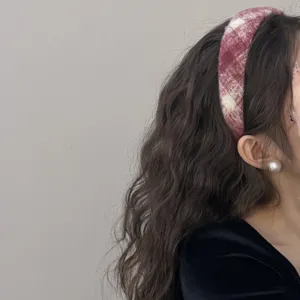 Elegant red plaid wool wide headband for women, stylish winter hair accessory for high top look.