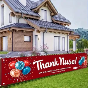 Large red Nurses Day thank you banner with balloon graphics hung on a garden fence