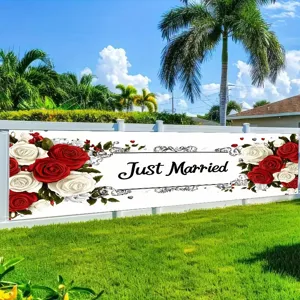 Elegant Just Married outdoor wedding banner featuring red and white roses on a white fence