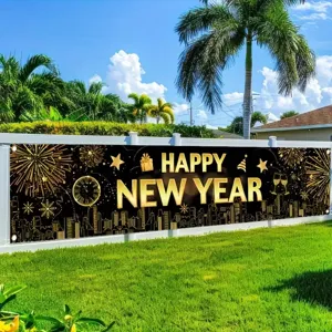 Large black and gold Happy New Year banner with fireworks and city skyline design