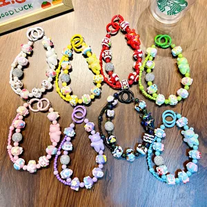 Colorful handmade beaded phone chains with cute cartoon bear charms in various colors.