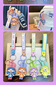 Close-up of colorful Rabbit Girl cartoon soft rubber keychains for bags and car keys
