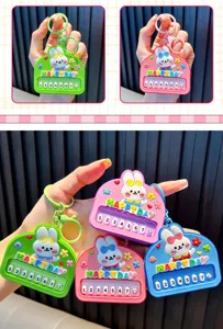 Collection of cute colorful rabbit piano keychains with numbered buttons for bags