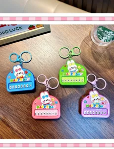 Detailed view of cute rabbit piano keychains in multiple vibrant colors for bags
