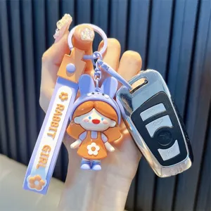 Cute cartoon rabbit girl keychain with purple rubber strap and floral design details