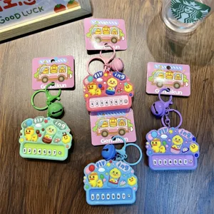 Set of 4 cute Genki Duck mini piano keychains with yellow duck bag charms for kids