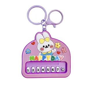Cute purple rabbit piano keychain with colorful numbered buttons for bag decoration