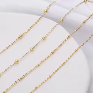 Macro view of 18K gold-plated bead chain for DIY jewelry making accessories materials