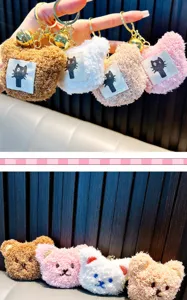 Close-up of colorful plush bear and cat keychains with soft teddy fleece texture