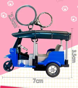 Detailed view of a blue Tuk Tuk model keychain with 7cm length and 3.5cm height.