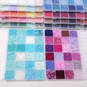 Close-up of DIY bead kits featuring colorful seed beads and bugle beads in organized boxes