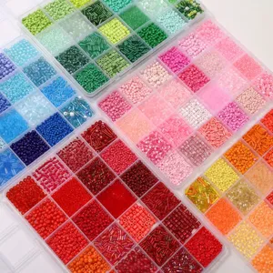 Close-up of vibrant seed and tube beads neatly organized in a DIY craft box set