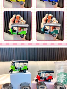 Detailed view of colorful mini pullback Tuk Tuk tricycle taxi model keychain pendants
