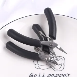 High quality close-up of stainless steel mini jewelry pliers with black handles for DIY crafting