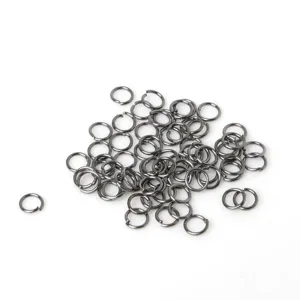 Detailed macro view of gunmetal open jump rings for handmade DIY jewelry connecting.