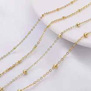 Macro view of 18K gold-filled bead chain links for DIY jewelry making accessories