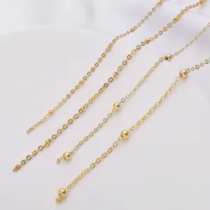 Close-up of four styles of 18K gold-filled jewelry extension chains for DIY designs
