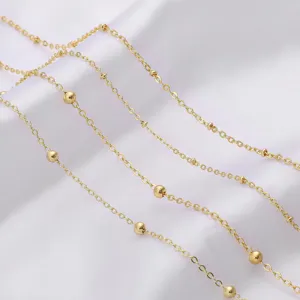 Macro detail of high quality 18K gold plated bead chain jewelry making material