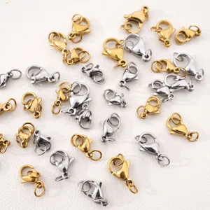 Macro detail of gold and silver stainless steel lobster clasps for jewelry making