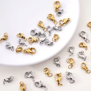 Detailed view of gold and silver stainless steel lobster clasps for jewelry making.