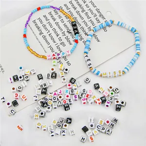 Macro view of colorful square acrylic alphabet letter beads for DIY bracelet jewelry