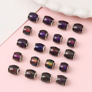 Detailed view of temperature-sensitive color-changing resin beads with alloy holes