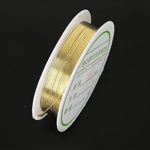 Gold copper wire spool for DIY jewelry making and handmade craft projects
