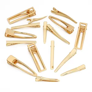 Assortiment gouden metalen eendenbek haarspelden voor DIY haaraccessoires en decoratie