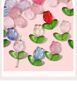 Detailed macro shot of gradient jelly pink tulip glass beads for DIY jewelry craft