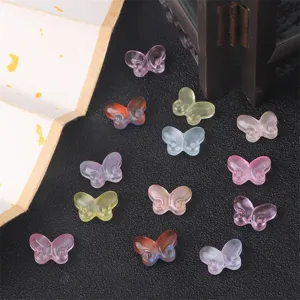 Close-up of colorful transparent glass butterfly beads for DIY ancient style hairpins