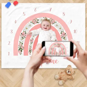 Soft floral pink rainbow baby milestone blanket for monthly growth photography sessions