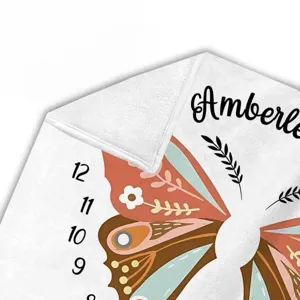 Soft baby milestone blanket with butterfly floral design and custom name Amberle