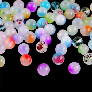 Close-up of colorful jelly glass beads with vibrant splatter and gradient patterns